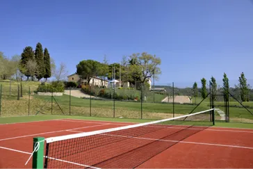 i grandi di toscana - tennisbaan met huis