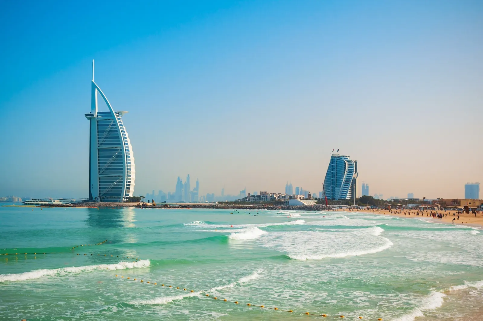 Burj Al Arab luxury hotel and Jumeirah public beach in Dubai city, UAE