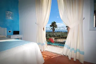 galanias hotel - sardinie -zeezicht vanuit kamer