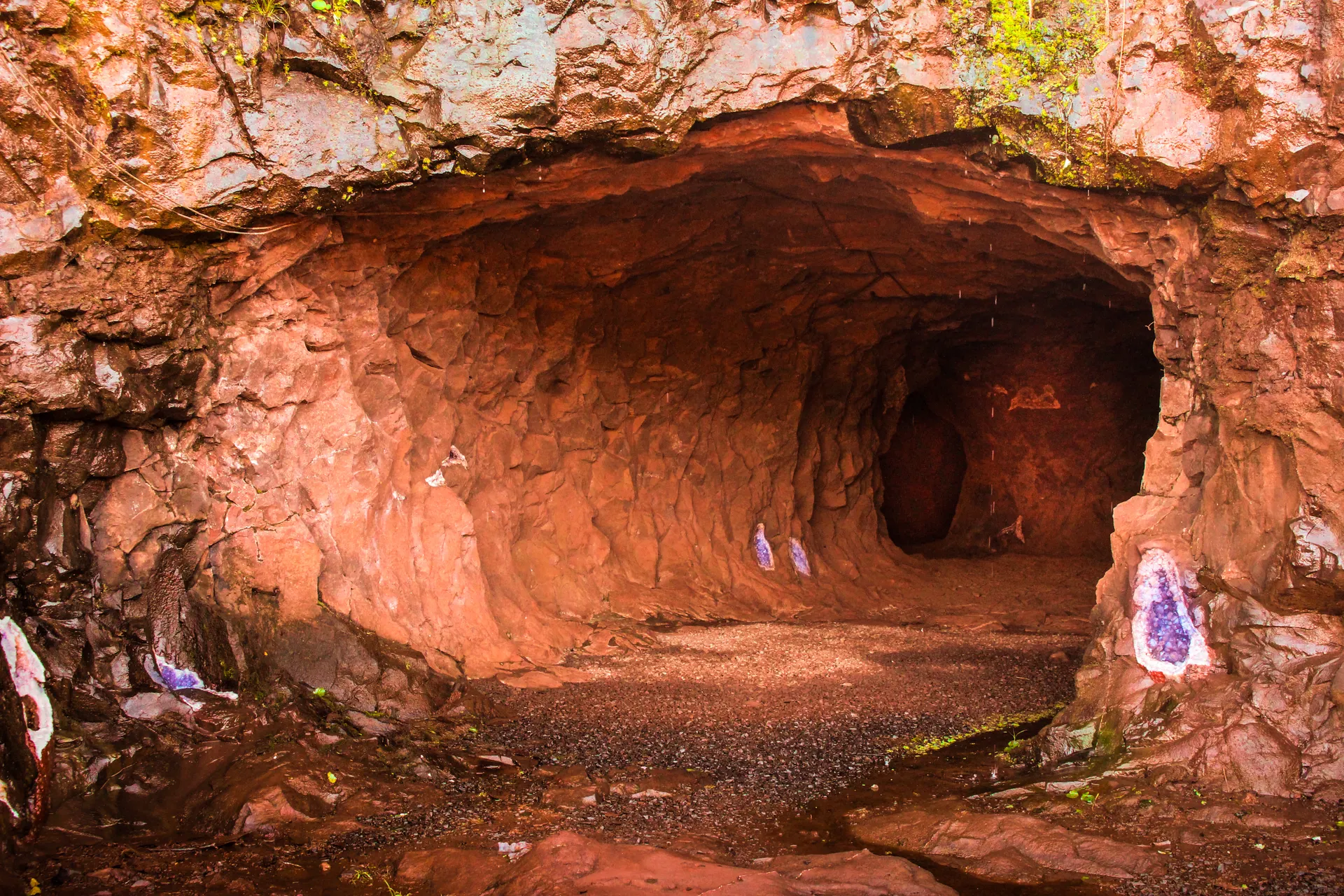 Large entrance to a quarry for the extraction of semiprecious stones in the mining complex of Wanda, at the entrance of the mine you can see semiprecious stones embedded i